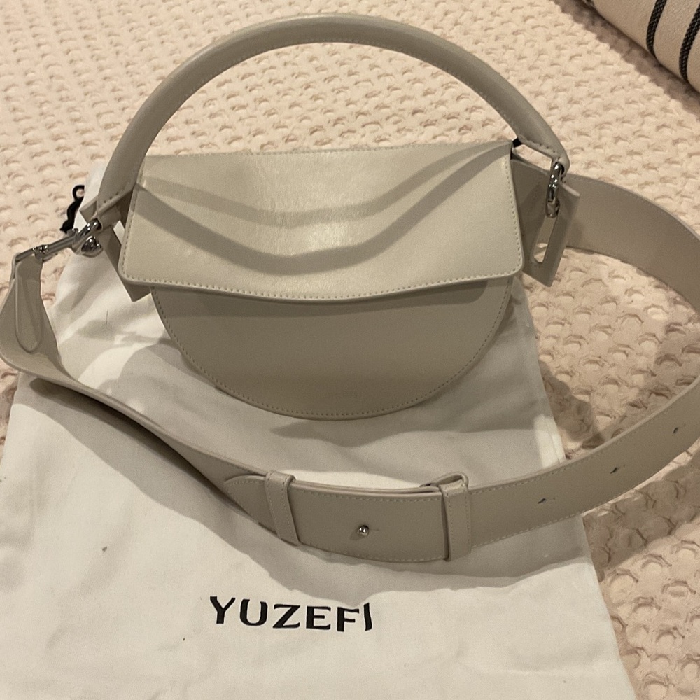 Yuzefi Cream Curved Flap Leather Shoulder Bag